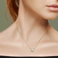 Discount 🎉 Mimi & Max 3/4 CT TGW Ethiopian Blue Opal and 1/10 CT TW Diamond Interlaced Halo Necklace 10K Yellow Gold for 👩 women ✔️ -Mimi & Max Shop a36f3862daf14780b7800a88b8f28aac 7961d2f4 8bd0 41e3 9fe9 9c7d423c2990 1080x