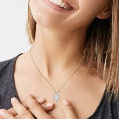 Outlet 🧨 Mimi & Max 2 1/6 CT TGW Oval Shape Blue Ethiopian Opal and White Topaz and Diamond Accent Halo Pendant with Chain in Yellow Plated Sterling Silver for 👩 women 😍 -Mimi & Max Shop d39b7384d6fb49438224afc40e516248 77a9e83c ee7b 465c 9207 cd39a021dc47 1080x